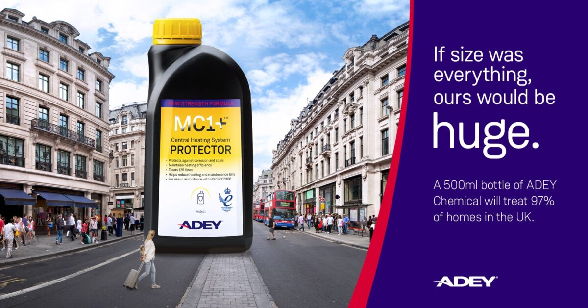 a bottle of ADEY chemical on a street